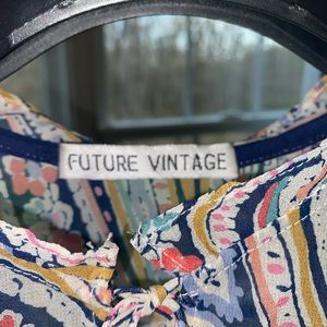 Anthropology mesh blouse size small.